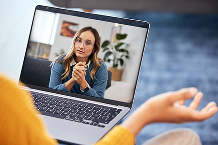 woman video call and therapy on laptop